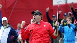 Fan David Johnson reacts after being pulled from the crowd and making a putt on the sixth green during practice prior to the 2016 Ryder Cup.