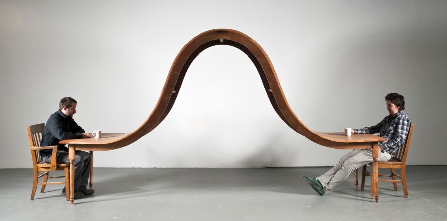 Michael Beitz, who previously worked as a furniture-maker, gives common objects a literal twist to comment on different elements of the human condition. "Dining Table," for example, is meant to look at "the silent tension that often exists between close people and the inability to communicate," he says. 