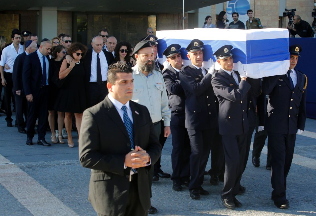 Members of the Knesset guard carry the coffin of former Israeli prime minister Shimon Peres.