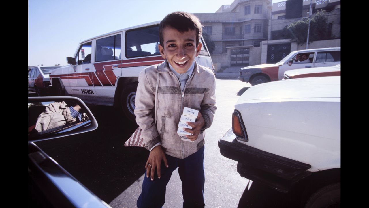 A boy begs for money in 1996. By then, Iraq was reeling under punishing international sanctions and widespread corruption. 