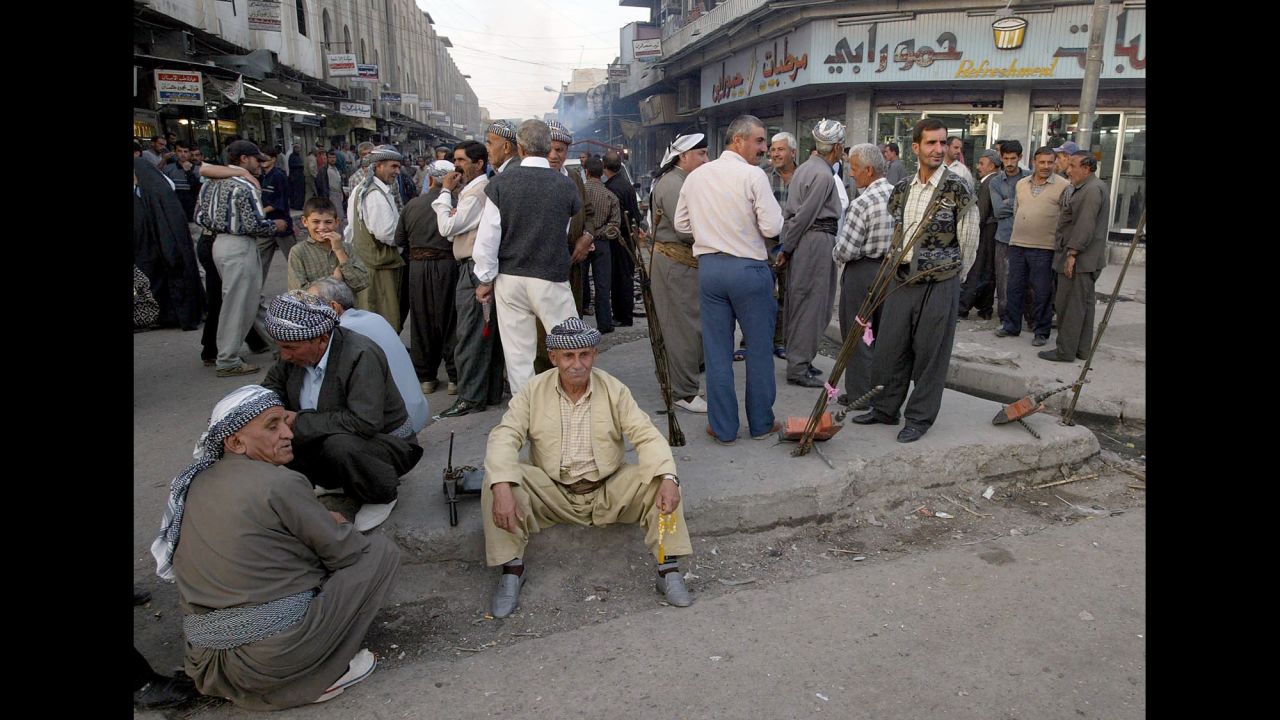 Kurds mingle with the crowds in central Mosul in 2002, just a few months before the U.S.-led invasion of Iraq.