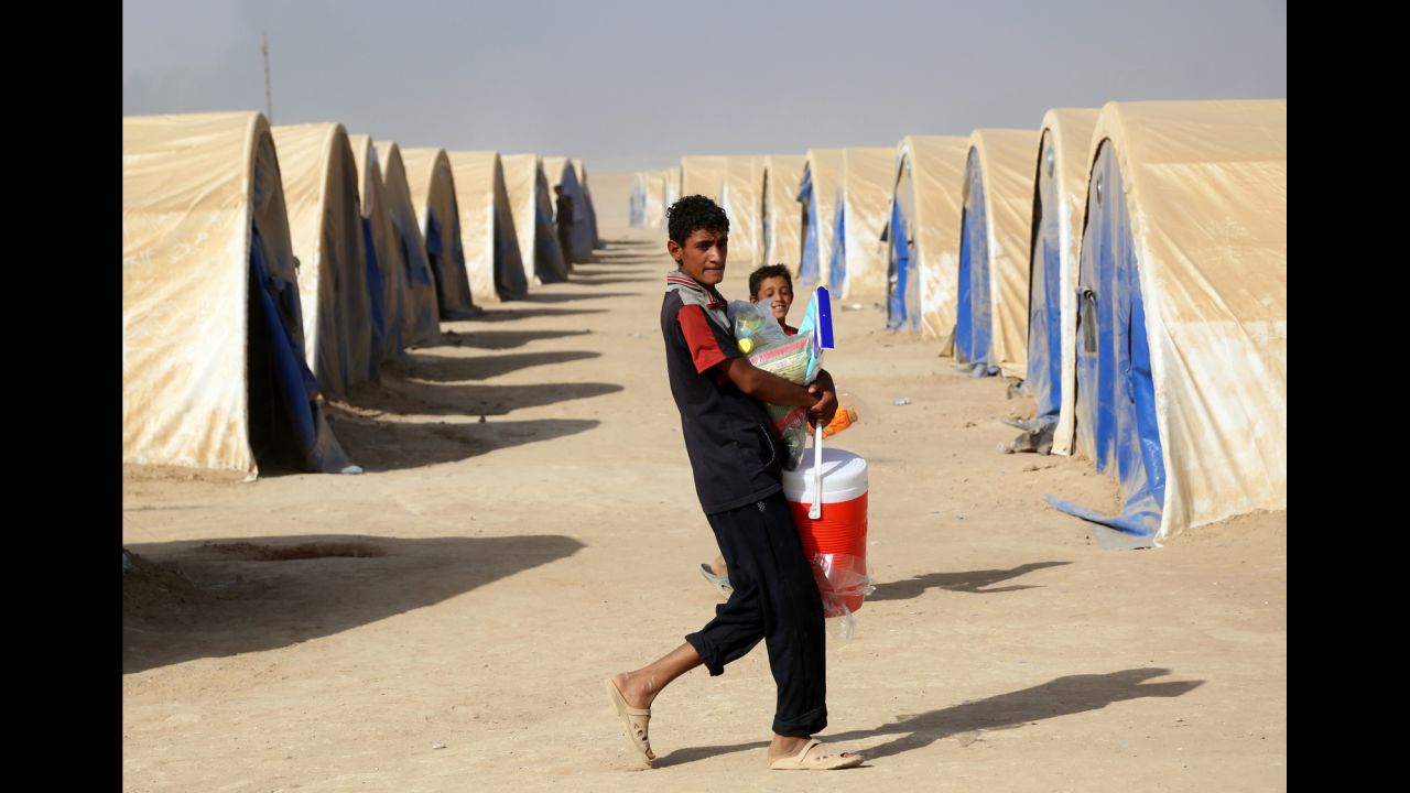 Iraqis displaced from ISIS-controlled towns and villages take shelter at this camp in Qayyarah, a few miles south of Mosul. Aid workers warn an assault on Mosul could trigger an exodus of catastrophic dimensions.