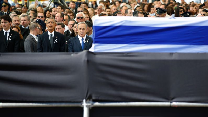 U.S. President Barack Obama stands beside Israeli Prime Minister Benjamin Netanyahu, front right, at <a href="index.php?page=&url=http%3A%2F%2Fwww.cnn.com%2F2016%2F09%2F30%2Fmiddleeast%2Fgallery%2Fshimon-peres-funeral%2Findex.html" target="_blank">the funeral of former Israeli President Shimon Peres</a> on Friday, September 30. Peres, who shared a Nobel Prize for forging a peace deal between Israelis and Palestinians, <a href="index.php?page=&url=http%3A%2F%2Fwww.cnn.com%2F2016%2F09%2F27%2Fmiddleeast%2Fshimon-peres-obit%2F" target="_blank">died Wednesday</a> at the age of 93.