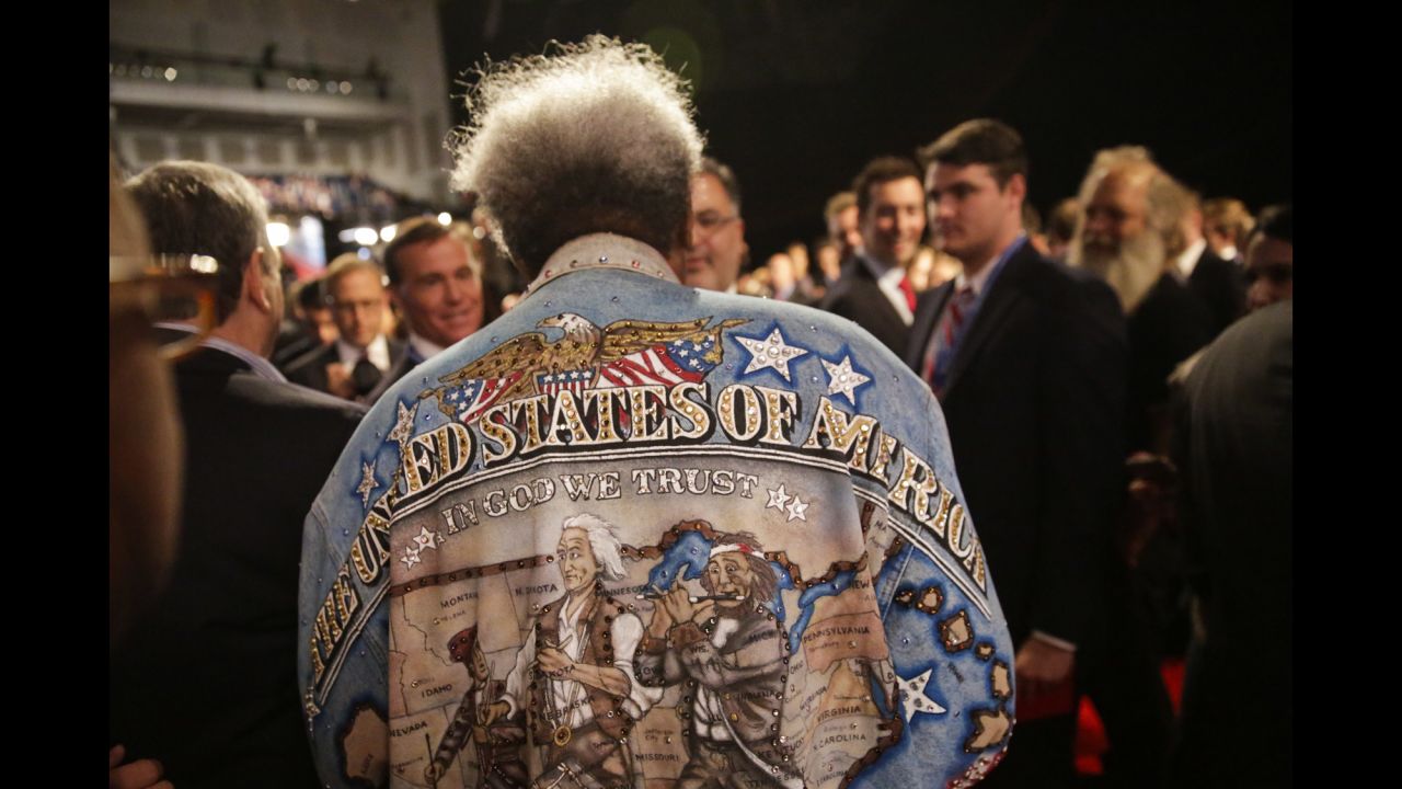 Boxing promoter Don King walks through the audience before the presidential debate in Hempstead, New York, on Monday, September 26.