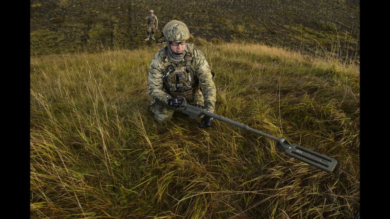 Air Force Tech. Sgt. Jason Umlauf uses a mine detector during a training exercise in Keflavik, Iceland, on Monday, September 19.