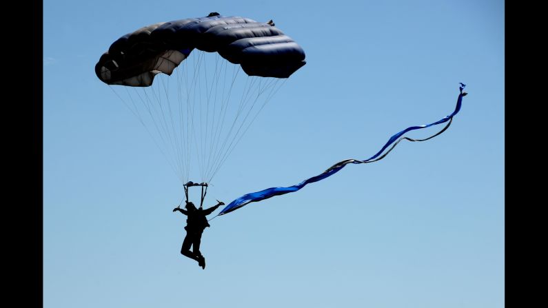 A member of the U.S. Air Force Wings of Blue parachute team descends toward Texas' Sheppard Air Force Base during an air show on Saturday, September 17.