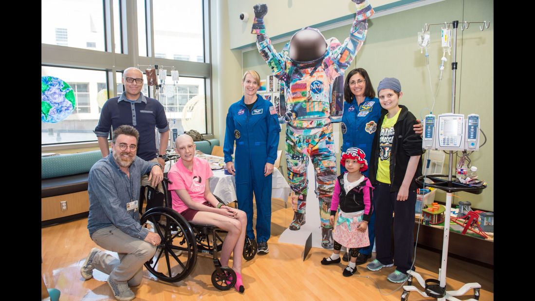 Ian Cion, the Arts in Medicine artist-in-residence at MD Anderson hospitals, (far left), coordinated with Rubins and retired astronaut Nicole Stott (second from right), to bring the Space Suit Project to life and allow childhood cancer patients to create the suits.