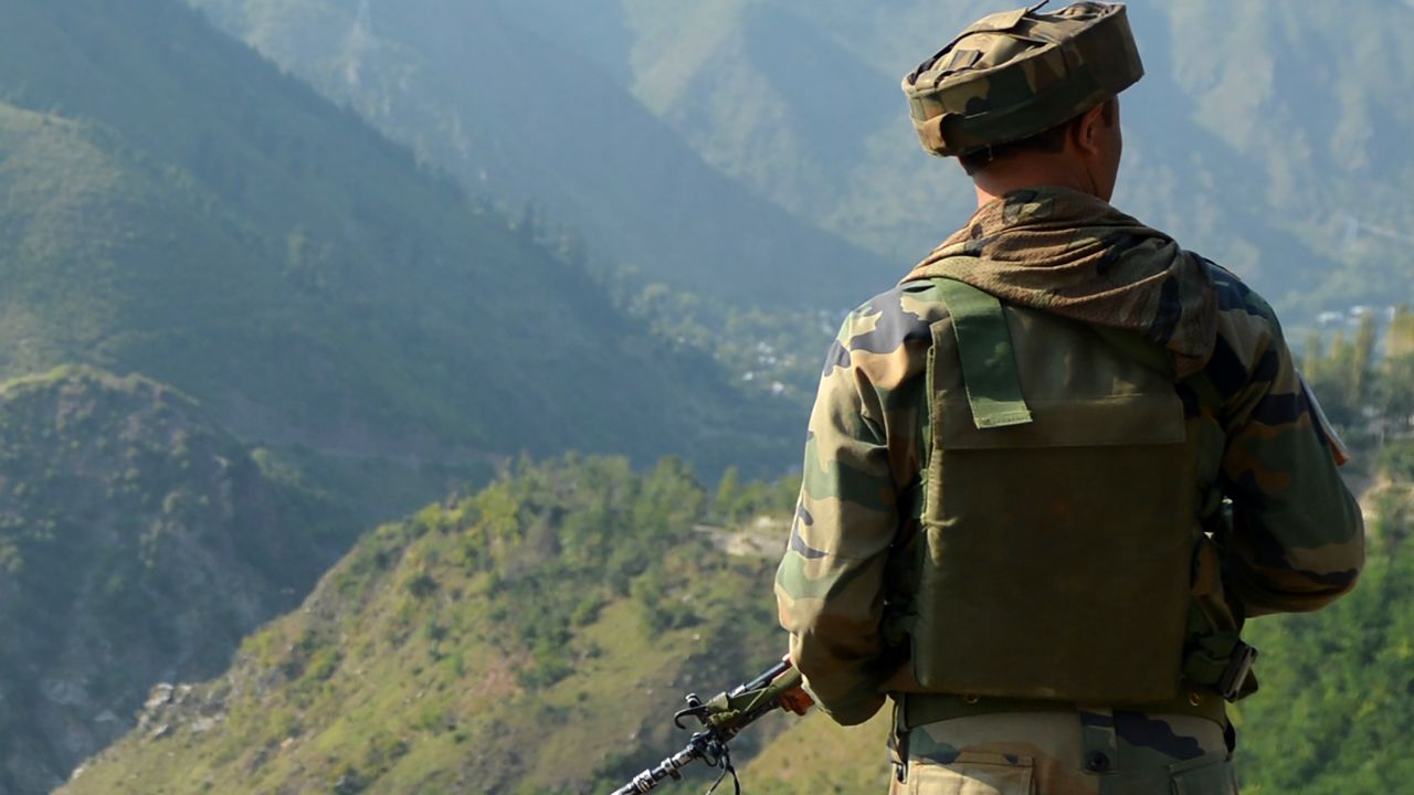 An Indian army soldier stationed near the border with Pakistan, known as the Line of Control (LoC), September 18, 2016. 