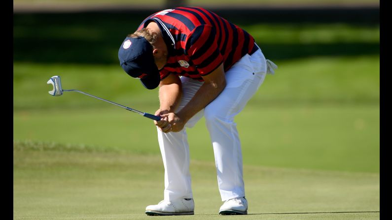 Ryan Moore of the United States reacts to a missed putt on the fourth green during afternoon fourball matches. 