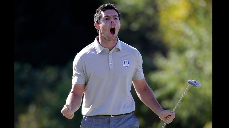 Rory McIlroy reacts after a putt on the tenth green during afternoon fourball matches.