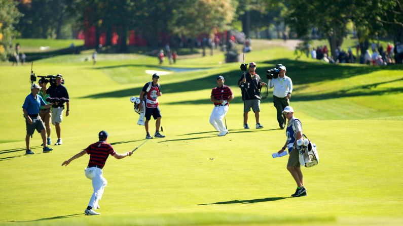 Jordan Spieth and Patrick Reed of the United States celebrate Patrick's shot on the sixth hole during the fourball matches for the 41st Ryder Cup at Hazeltine National Golf Course on October 1.