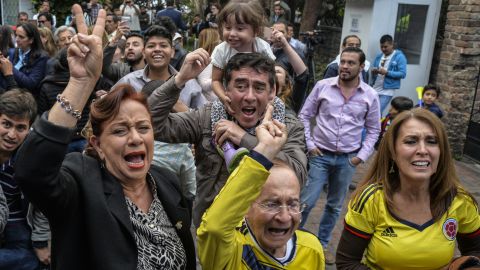 Colombians celebrate as the results of a referendum in October were announced, rejecting a peace deal with FARC rebels.