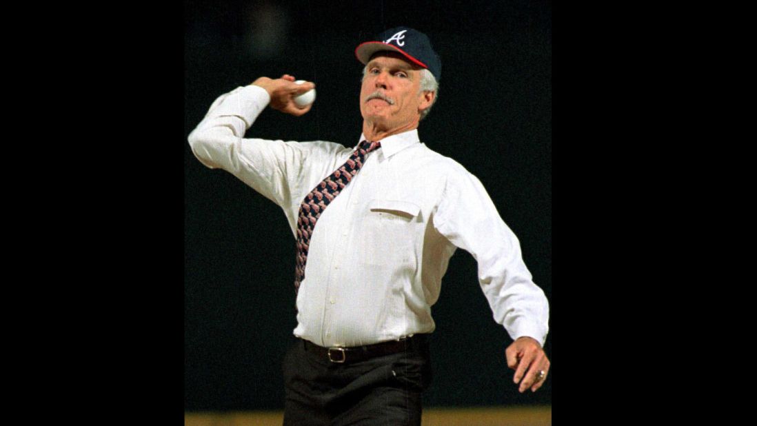 Ted Turner, then-owner of the Braves, throws the first pitch before the first regular season game in Turner Field.