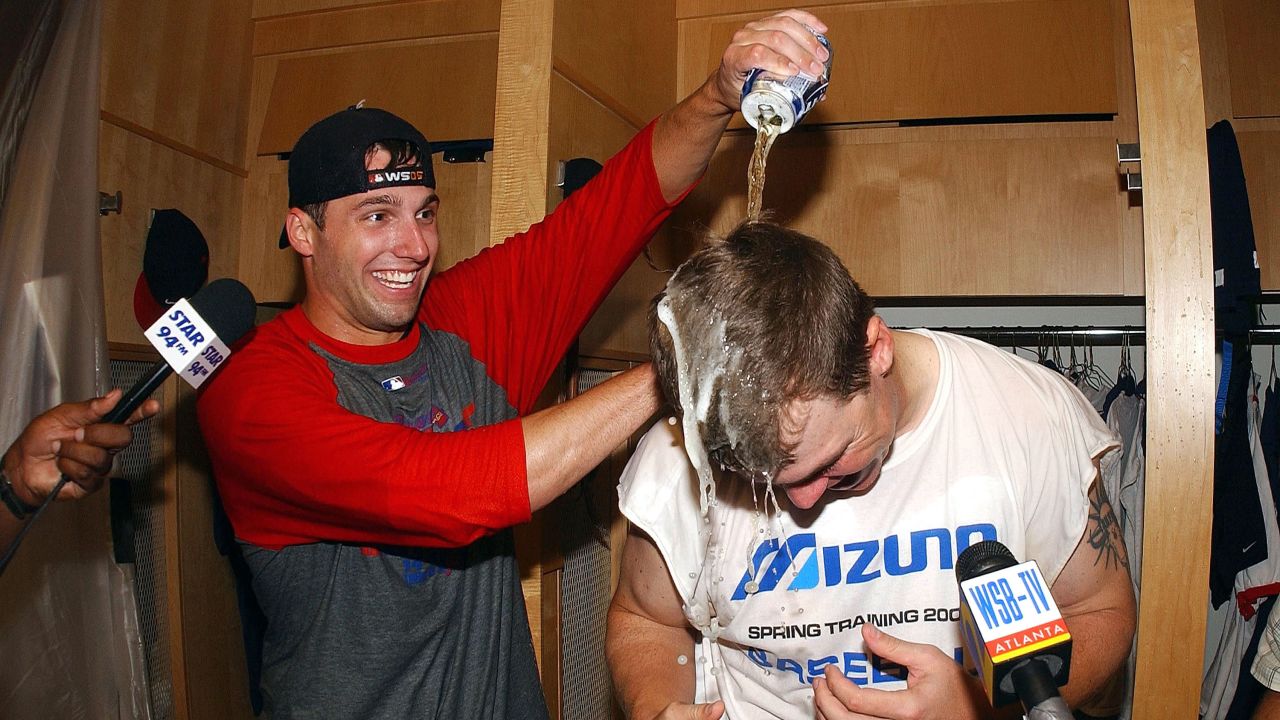 Chipper Jones is doused by Jeff Francoeur in the locker room after defeating the Colorado Rockies to win the Braves' 14th consecutive division title on September 27, 2005, at Turner Field. The Braves beat the Rockies 12-3.  