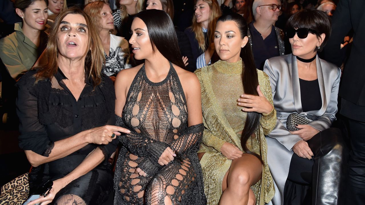 Kardashian West attends Paris Fashion Week with her sister and mother.
