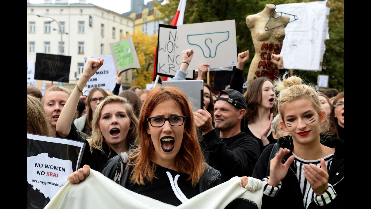 Polish women take part in a nationwide strike and demonstration to protest against a legislative proposal for a total ban of abortion on October 3, 2016 in Warsaw.