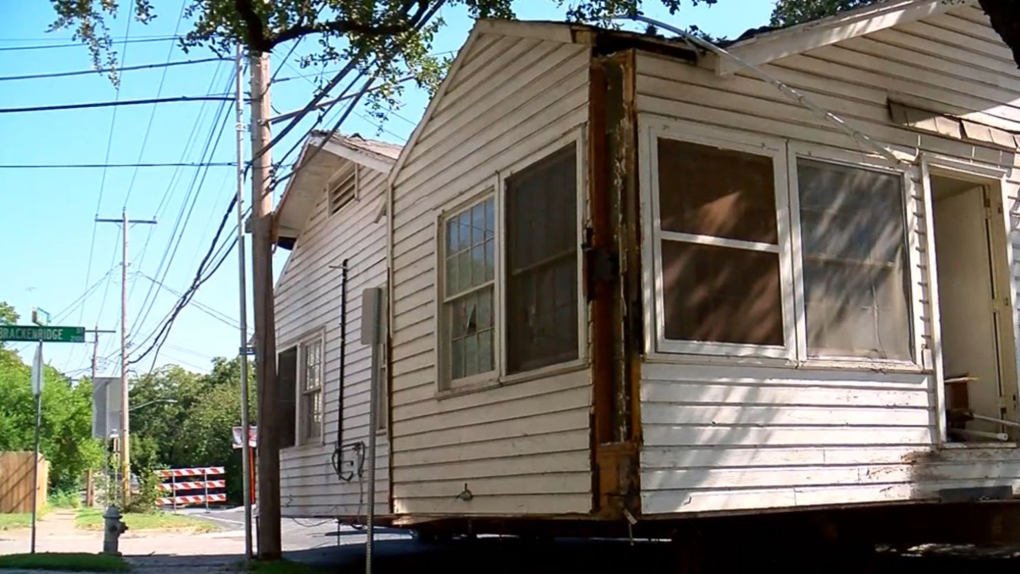 A moving company left this house in the middle of an Austin, Texas, street after it became too difficult to try and move it any farther.