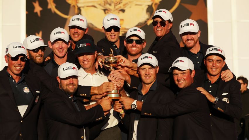 CHASKA, MN - OCTOBER 02:  Matt Kuchar, Dustin Johnson, Brandt Snedeker, Ryan Moore, Davis Love III, Brooks Koepka, Zach Johnson, J.B. Holmes, Jordan Spieth, Phil Mickelson, Jimmy Walker and Rickie Fowler of the United States celebrate during the closing ceremony of the 2016 Ryder Cup at Hazeltine National Golf Club on October 2, 2016 in Chaska, Minnesota.  (Photo by Streeter Lecka/Getty Images)