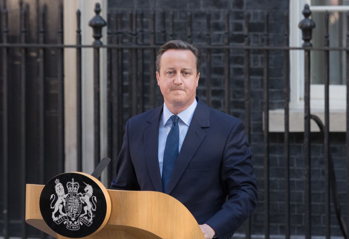 British Prime Minister David Cameron resigns on the steps of 10 Downing Street.