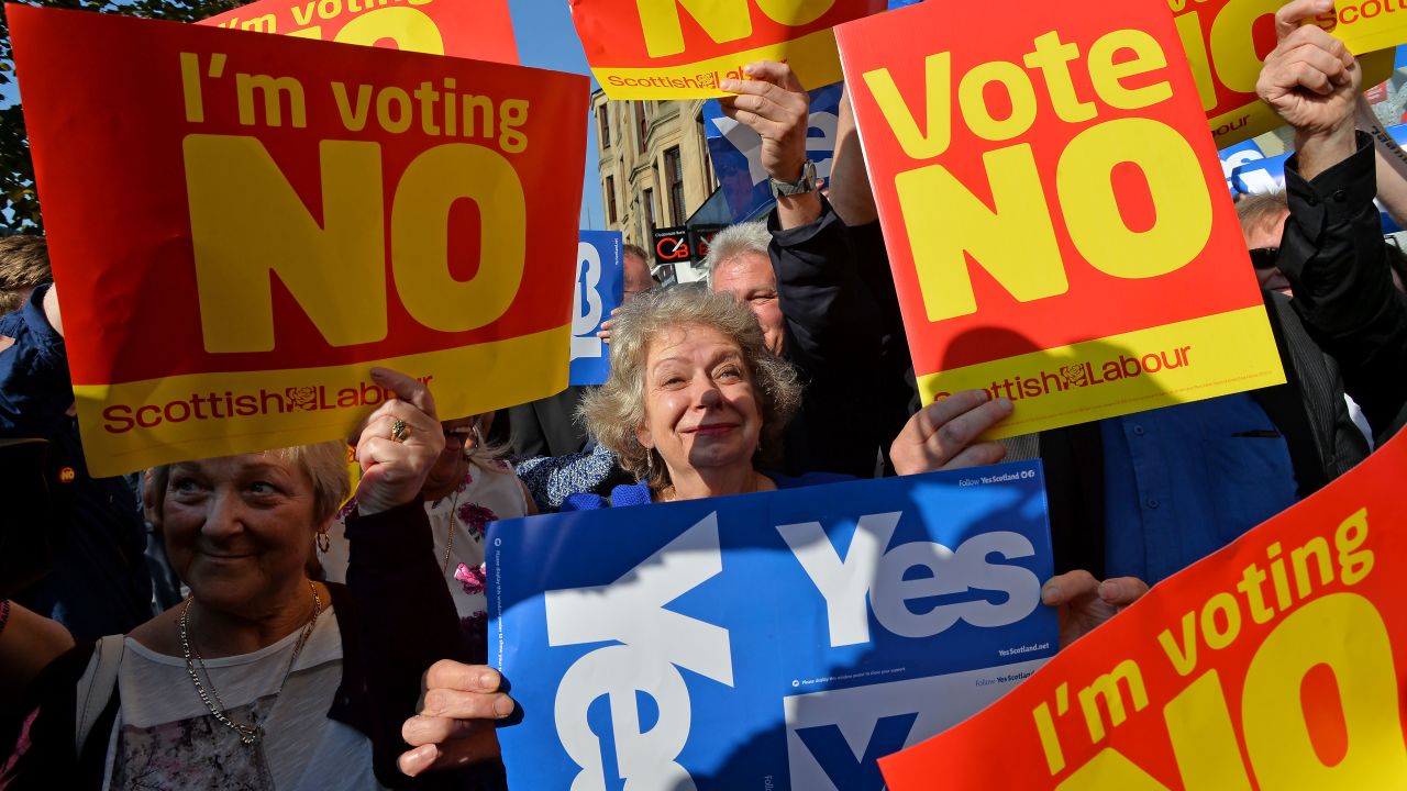 "Yes" and "No" voters protest on Rutherglen main street on September 10, 2014 in Glasgow, Scotland.