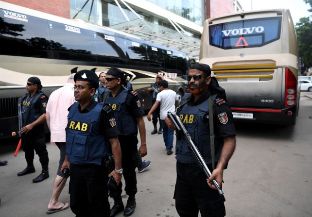An estimated 500 security officials are protecting the England team with rooftop snipers, sniffer dogs, a bomb disposal unit and even a decoy team coach on hand as well as a bevy of armed guards. Roads were shut down for the team's first trip to the Sher-e-Bangla Stadium to train.