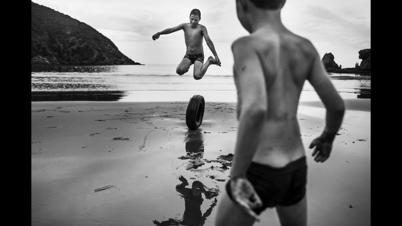Two boys play on a beach in rural New Zealand. Niki Boon has been photographing her four home-schooled children as they explore the family's 10-acre property in Blenheim, on the northeastern tip of the country's South Island. 