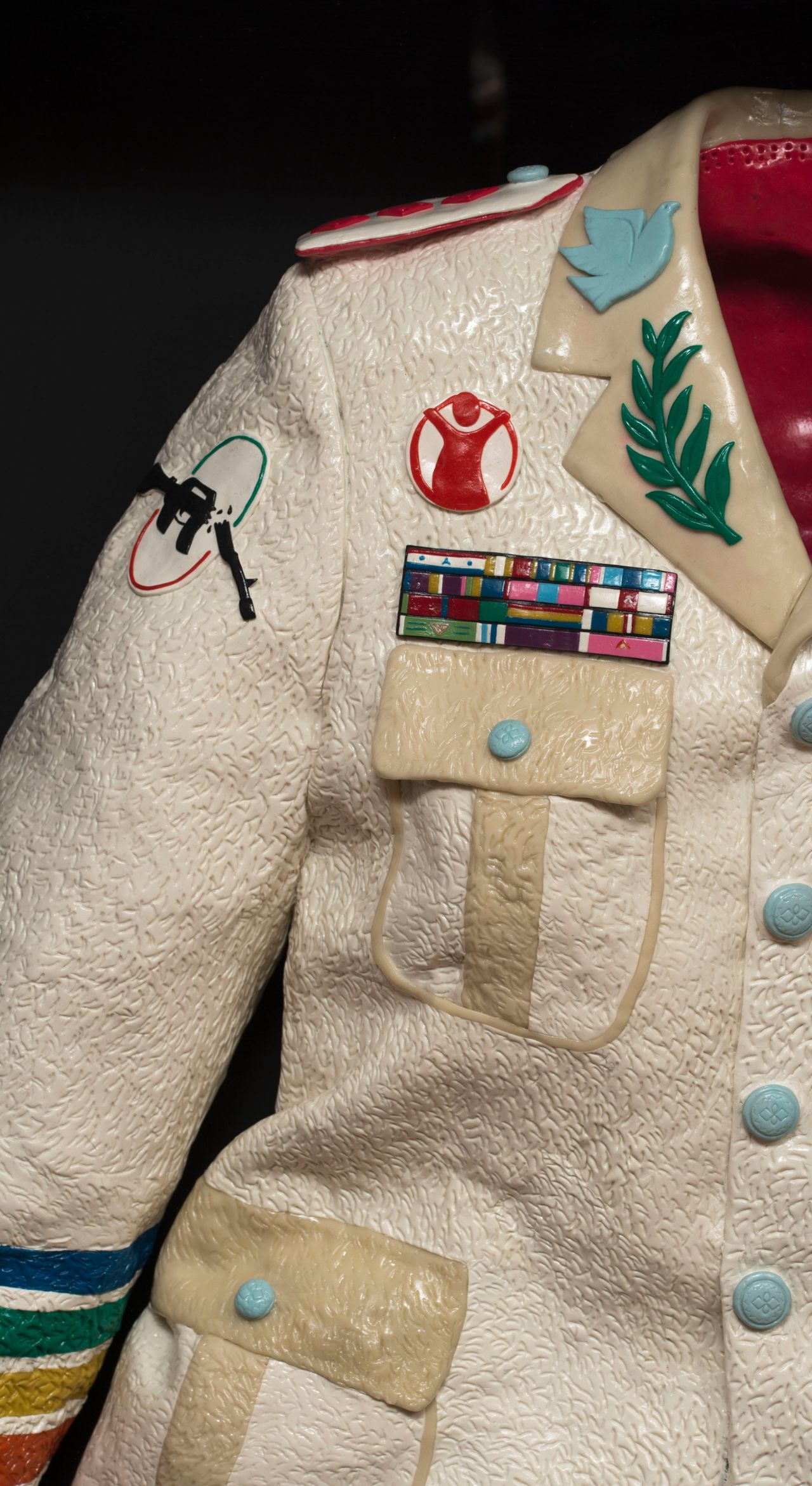 Savini created a military jacket bearing logos of peace in one of his latest sculptures.
