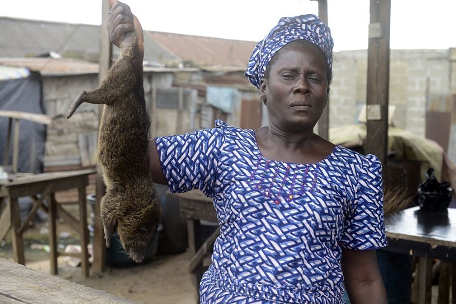 Infected bushmeat could be the source of animal-human Ebola transmission. Pictured, a bushmeat seller at the Ajegunle-Ikorodu market in Lagos, August 2014.