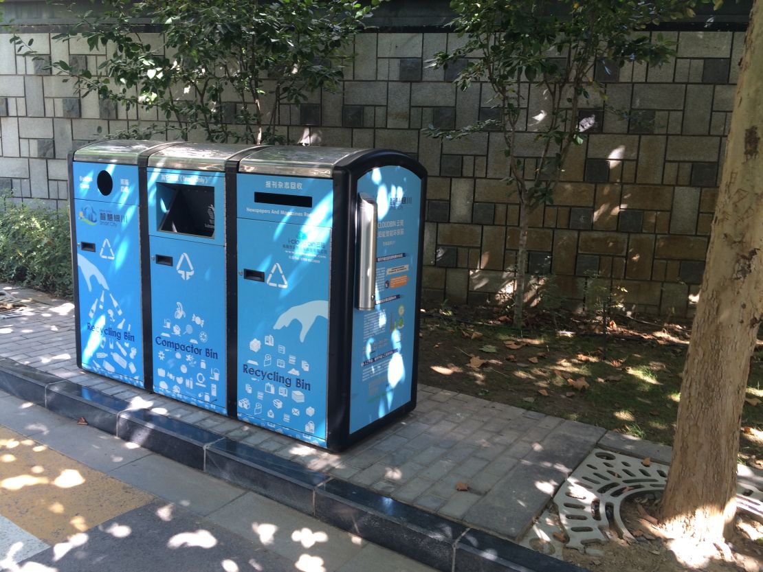 Public trash bins are solar powered and double as compactors.
