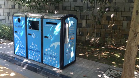 Public trash bins are solar powered and double as compactors. 