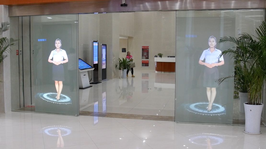 Holograms welcome visitors to the City Hall in Yinchaun,.