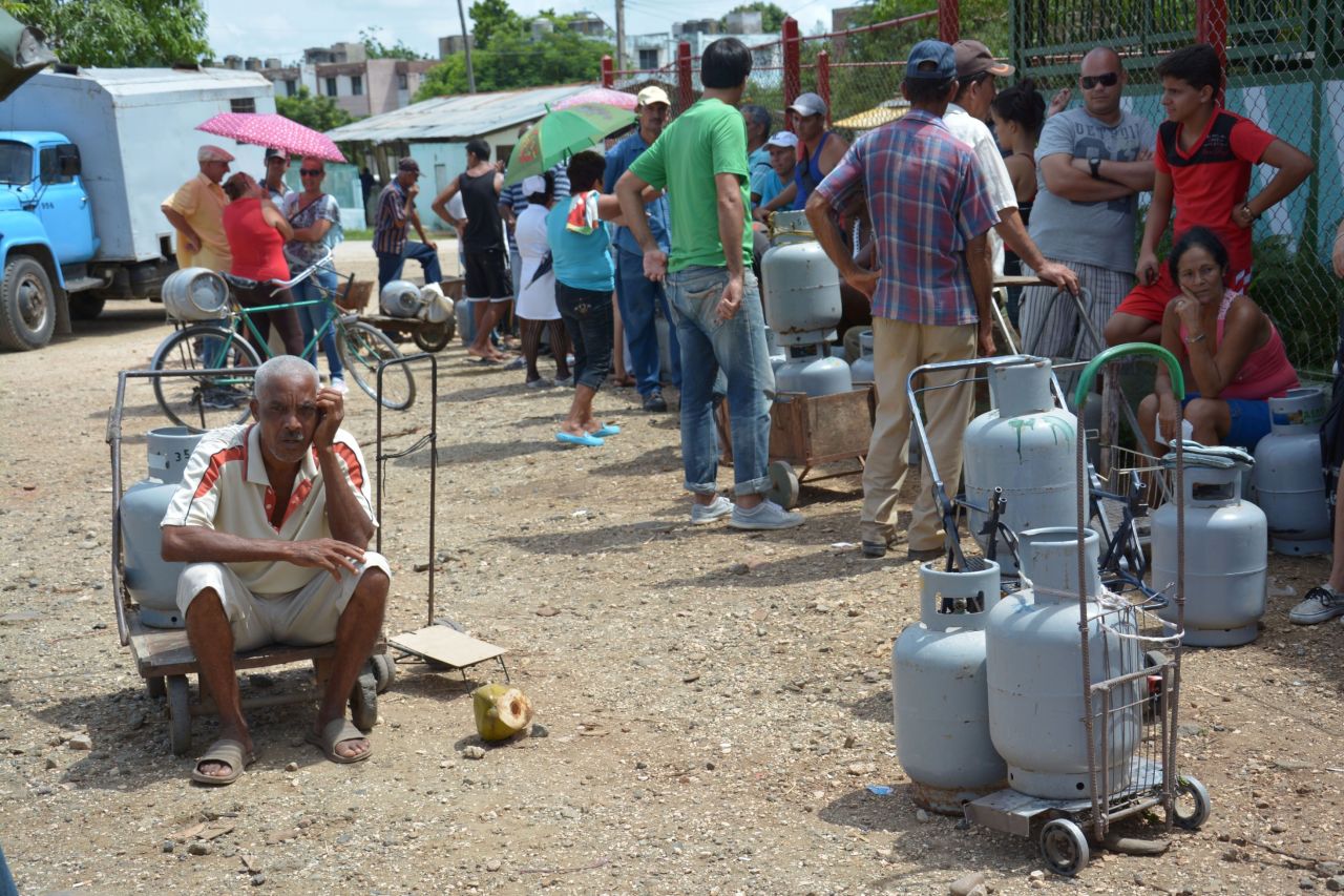Residents of Cuba's Holguin Province line up to buy gas on October 2.
