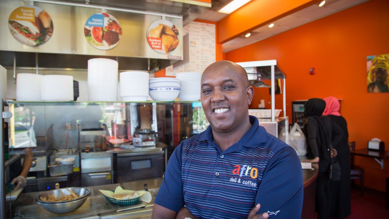 Abdirahman Kahin, owner of Afro Deli restaurant in Minneapolis. Came to the U.S. from Somalia in the 1990s. Leans Democrat and is supporting Hillary Clinton. <br /><br />"We feel like we're double victims because number one, because as Americans we been affected by what happened, 9/11 because what these guys did. This affected me as an American. At the same time, other Americans see us as traitors."