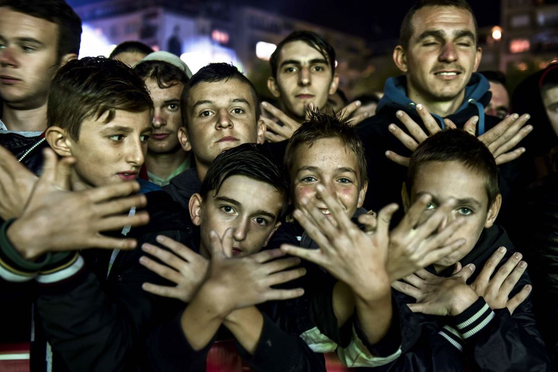 Kosovo fans watch the Albania-Serbia Euro 2016 qualifier on a big screen in Pristina.