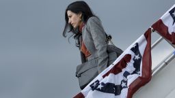 Huma Abedin follows Democratic presidential nominee Hillary Clinton as she arrives at Harrisburg International Airport October 4, 2016 in Middletown, Pennsylvania.