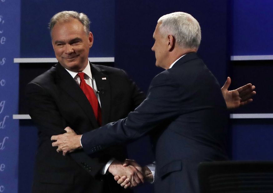 U.S. Sen. Tim Kaine, left, shakes hands with Indiana Gov. Mike Pence after the vice presidential debate in Farmville, Virginia, on Tuesday, October 4. Kaine is the running mate to Democratic nominee Hillary Clinton. Pence is on the ticket with Republican nominee Donald Trump.