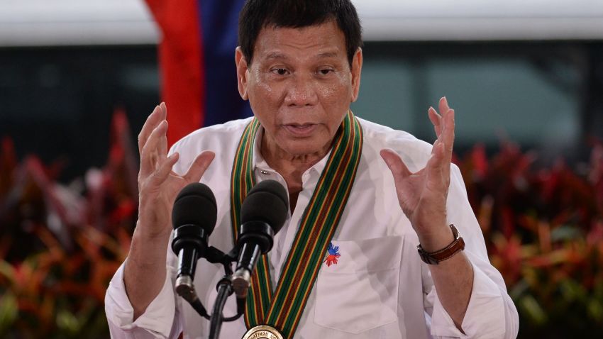 Philippine President Rodrigo Duterte gestures as he delivers a speech during a "talk to the troops" visit to meet military personnel in Manila on October 4, 2016.
Rodrigo Duterte launched a fresh tirade at the United States on October 4, telling Barack Obama to "go to hell" as the longtime allies launched war games that the firebrand Philippine leader warned could be their last. / AFP / TED ALJIBE        (Photo credit should read TED ALJIBE/AFP/Getty Images)