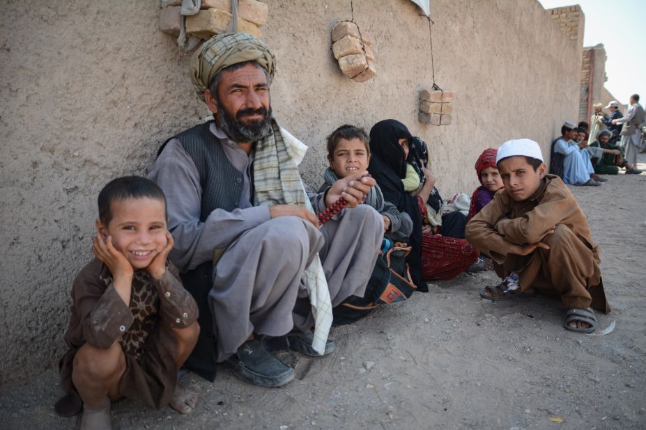 Ghousuddin, 50, and his wife and five children fled fighting in Helmand and headed for Herat. <br />In the rush to leave, there was no time to put shoes on his youngest child. <br />"I wish for peace and security in my country," said Ghousuddin. <br />"Where shall I go with all these kids? I don't have money to leave my country and ask for asylum in foreign countries."