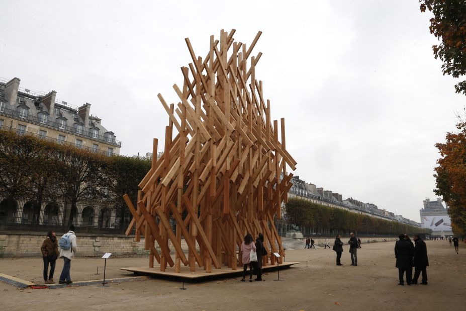 This wooden pavilion, which people can climb up, was temporarily erected at the Tuileries Garden, near the Louvre museum in Paris, as part of the FIAC International Contemporary Art Fair on October 20, 2015.