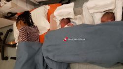 A photo released by the Italian coast guard shows babies born in a migrant rescue ship off the Sicilian coast.