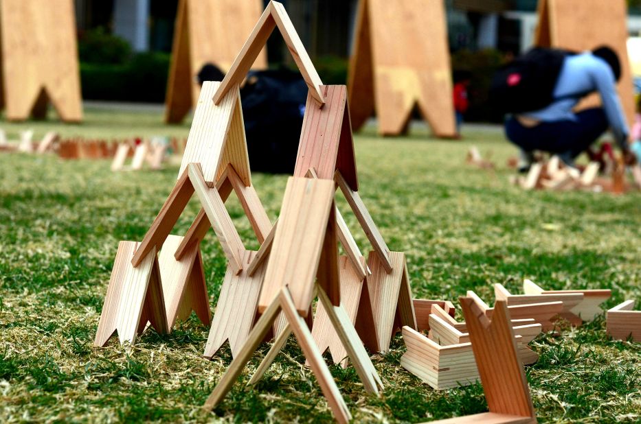 Kuma's fascination with layering wood was evident when he created Tsumiki (meaning "wodden blocks" in Japanese). This simple triangle-shaped children's toy was dubbed the Japanese version of Lego.