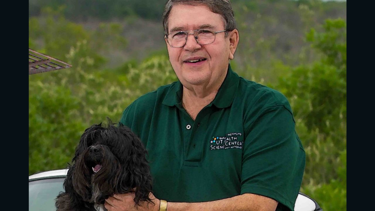 Arlan Richardson with his Tibetan terrier, MoMo.