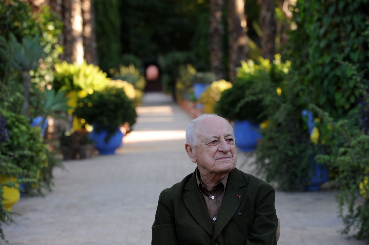 Pierre Berge, Saint Laurent's partner in business, and one time in love, in the Jardin Majorelle. The garden now belongs to their joint foundation. Its profit's have financed the upcoming museum, but also philanthropic projects across the country, including the Philharmonic Orchestra in Rabat, an arthouse cinema in Tangier, AIDS charities and educational causes, says Fierro.