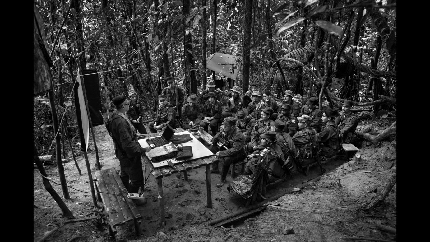 FARC negotiator Ruben Zamora briefs a group of rebels on a peace deal with the Colombian government. The country voted the peace deal down in a referendum this week.