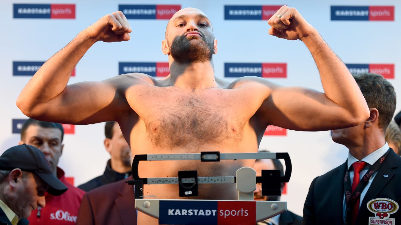 ESSEN, GERMANY - NOVEMBER 27: Tyson Fury of UK poses after the weigh in at Karstadt Sport on November 27, 2015 in Essen, Germany.  (Photo by Lars Baron/Bongarts/Getty Images)
