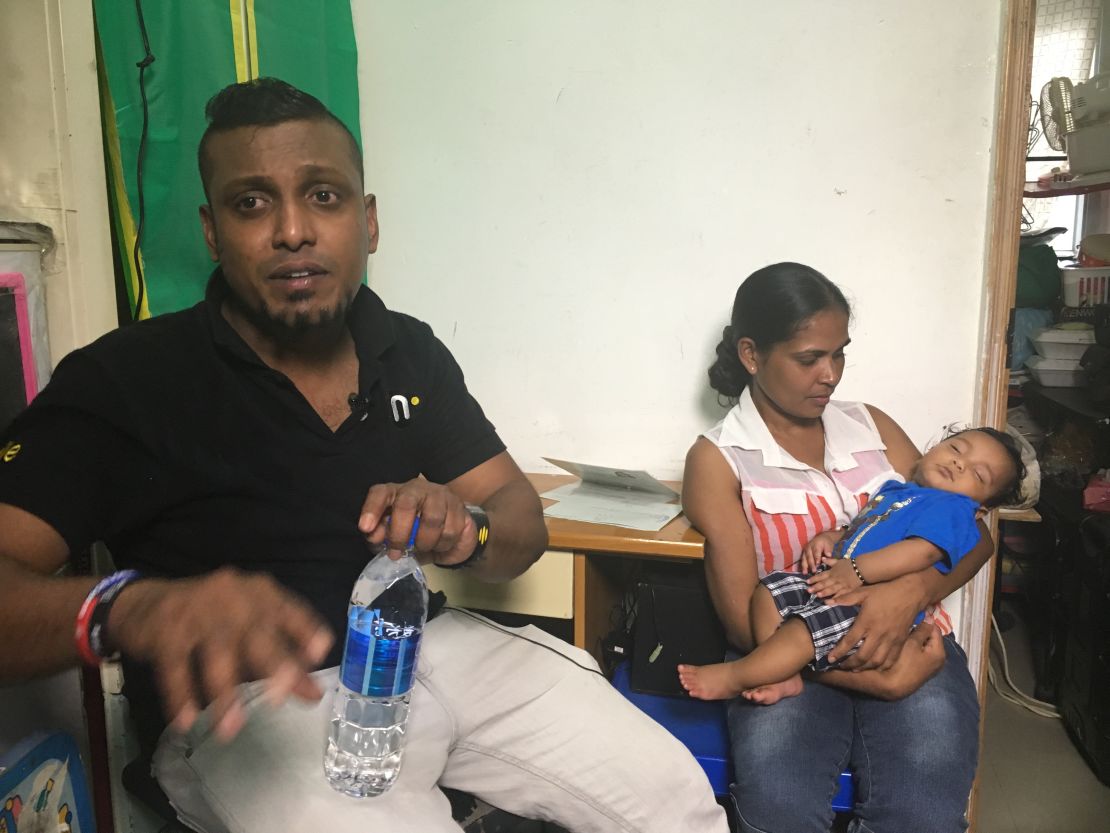 Supun Kellapatha, an asylum-seeker from Sri Lanka, photographed with his wife Nadeeka Nonis and their son Dinath.