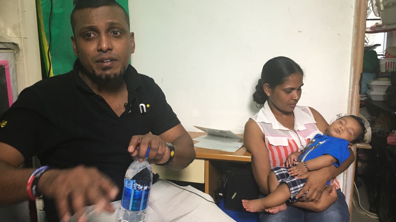 Supun Kellapatha, an asylum-seeker from Sri Lanka, photographed with his wife Nadeeka Nonis and their son Dinath.