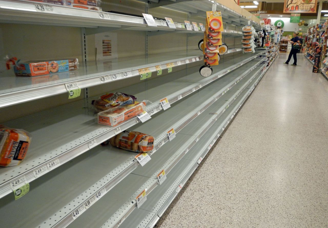 A supermarket shelf is nearly cleared out in Titusville, Florida, on Wednesday, October 5.