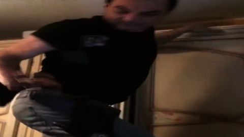 Italian mafia boss pulled from his cupboard hideout.