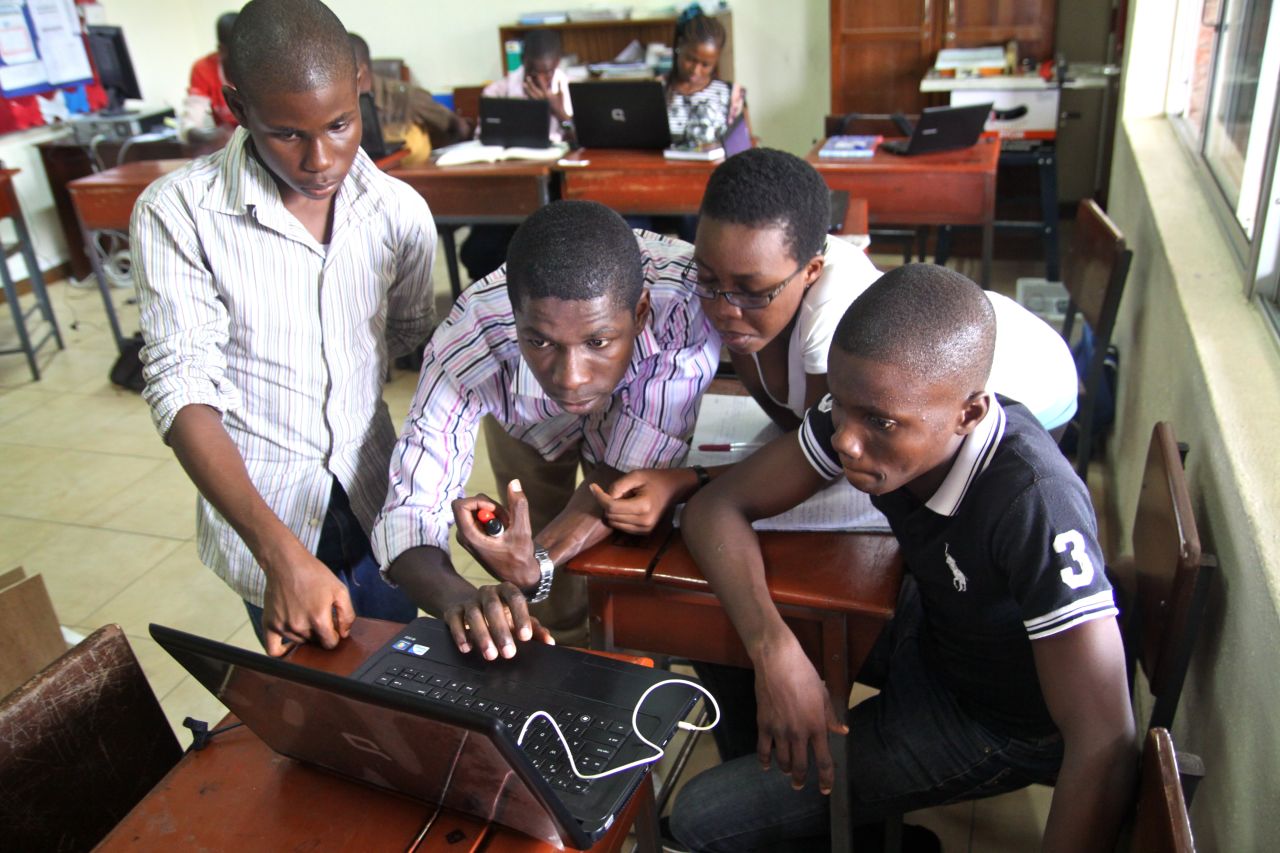 Students take part in a robotics academy in Lagos, Nigeria, which was started by MIT graduate Obinna Ukwuani. 
